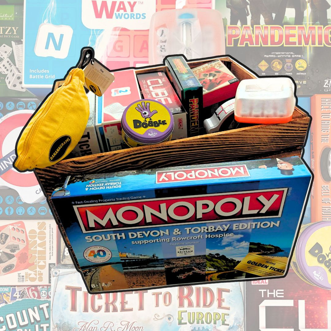 Basket with board games including Monopoly and Pandemic, on a collage background.